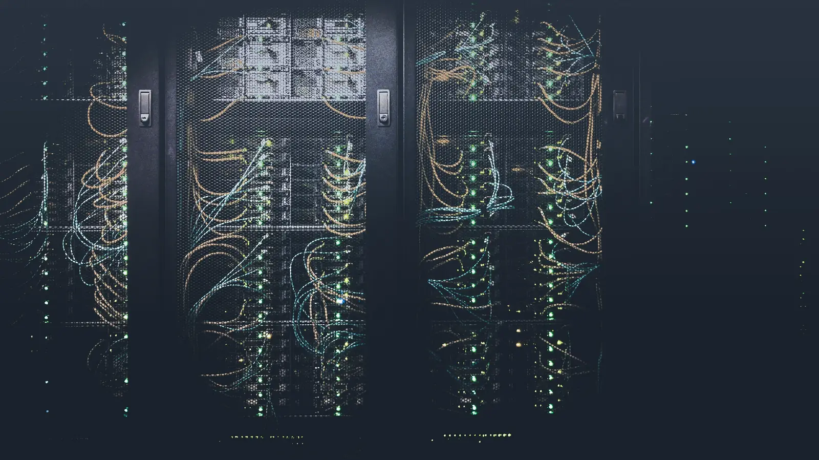 Specialists working on technology in a modern office